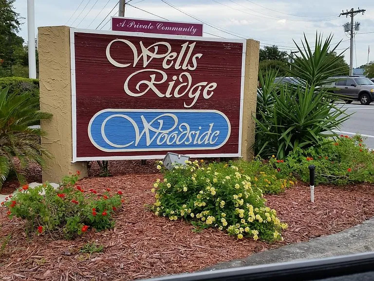 Entrance off Wells Rd at Debarry Ave