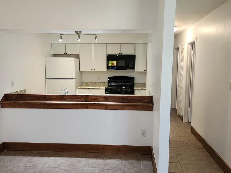 Dining area off kitchen with small bar