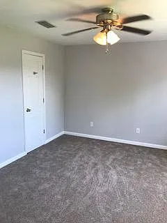 Master bedroom with private bathroom entrance