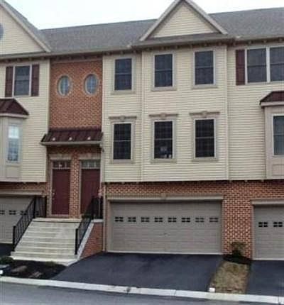 High end townhouse with two care garage