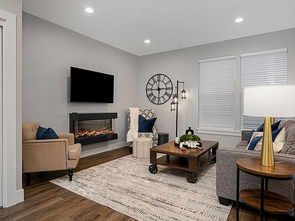 Spacious living room with fireplace
