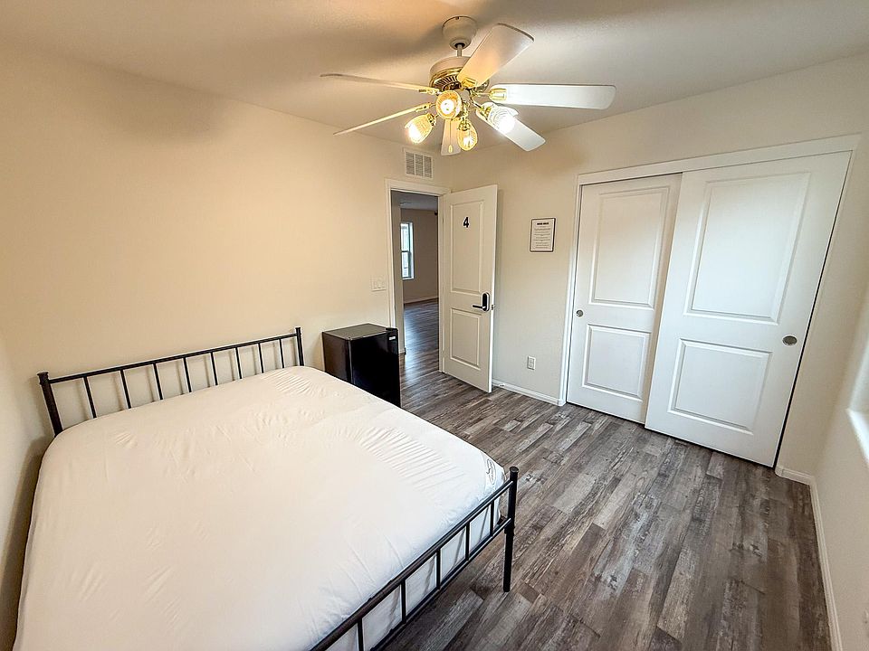 Bedroom #4 with Ceiling fan and minifridge