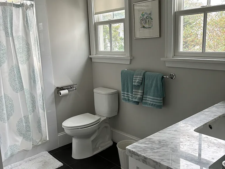 Upstairs Jack & Jill bath. Window in shower