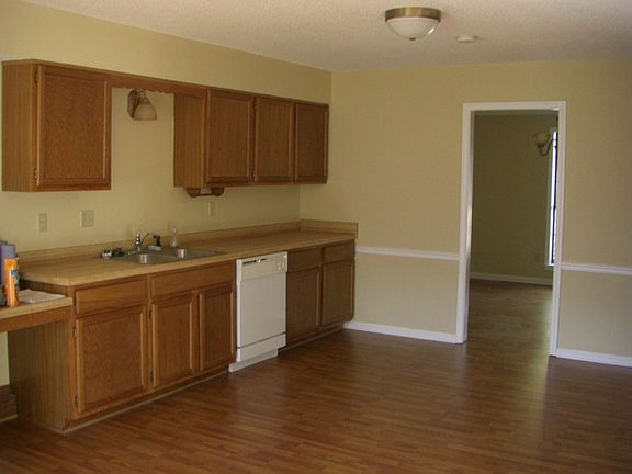 other side of kitchen looking at door to dining room