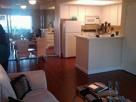 View across den into kitchen