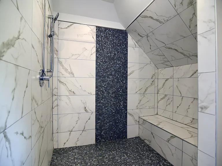 One of a One of an kindOwner's retreat with huge shower, very modern and stylish with built in shower bench about 5 feet long! Multi Function Hand Shower Package - Includes Slide Bar and Hose.