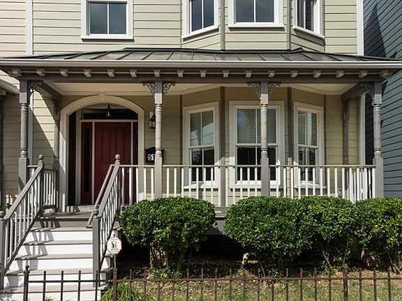 Front porch,w/metal roof, composite decking, bay window.