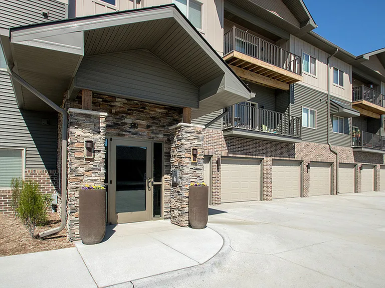 Front exterior of a building entrance at Avenue 204.