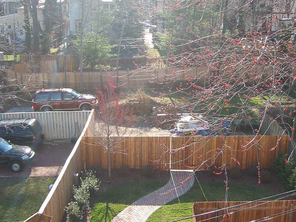 Landscaped Backyard and parking (view from 3d floor deck)