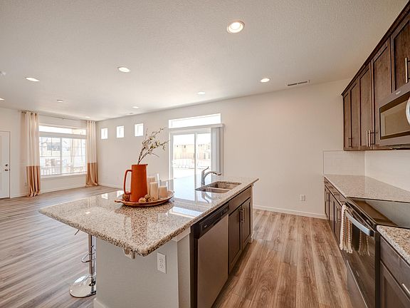 Kitchen and great room with morning light.