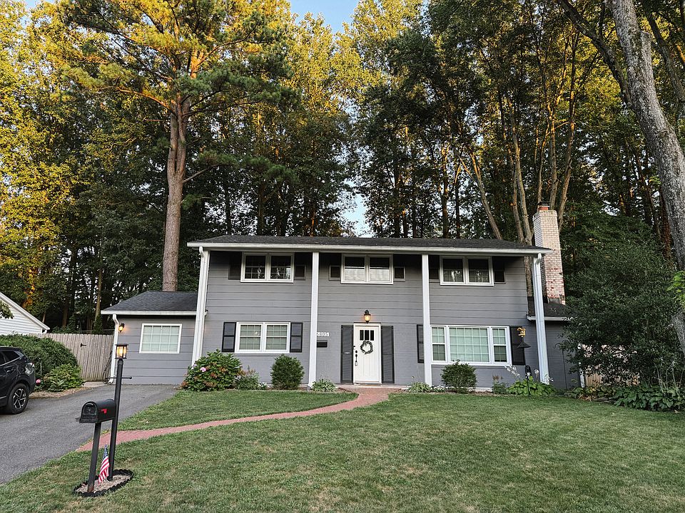 Lovely 4-bedroom colonial on a quiet street surrounded by mature trees