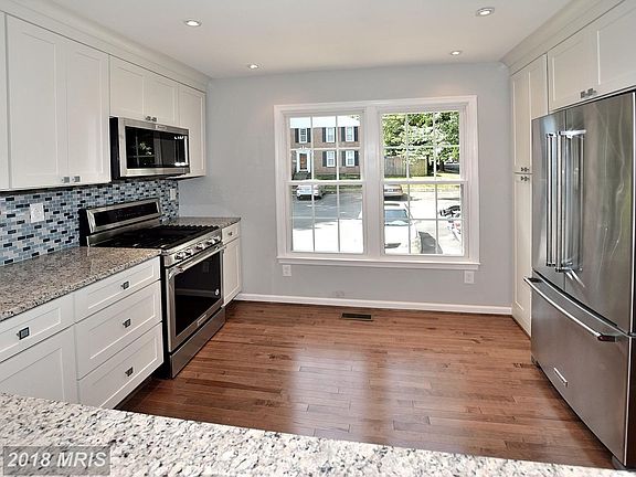 New soft close, solid wood, white shaker cabinets