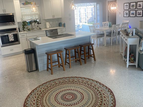 open living space, quartz tops, great lighting, stainless appliances