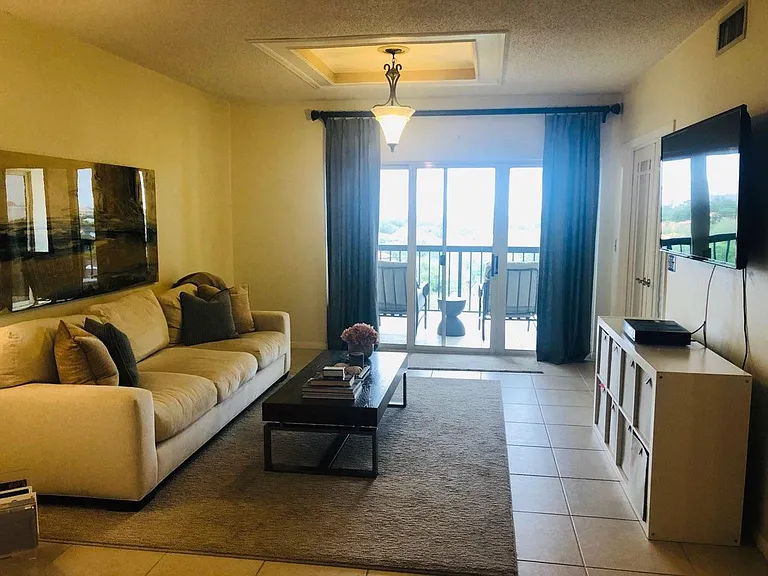 Living room and balcony.