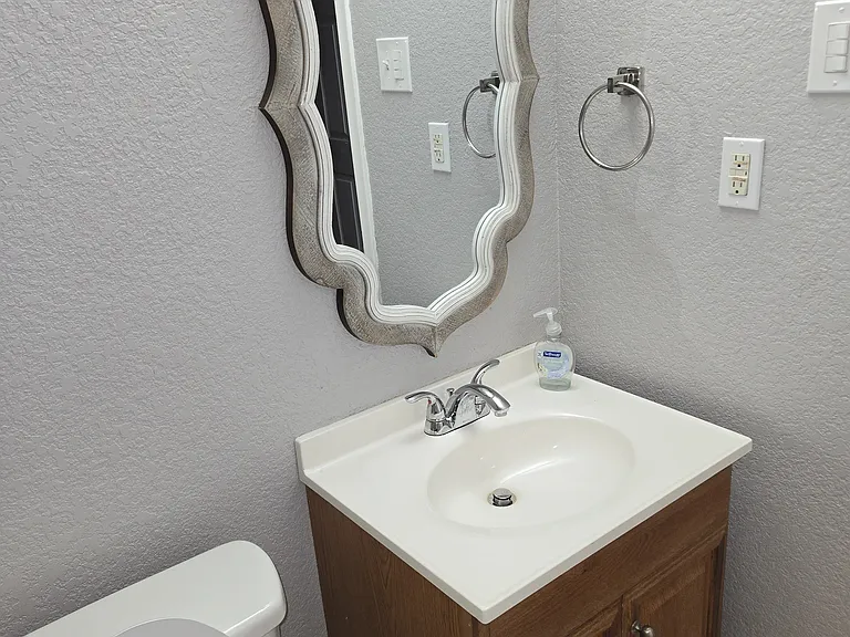 Hall Bathroom .. New Mirror and Refinished Tub