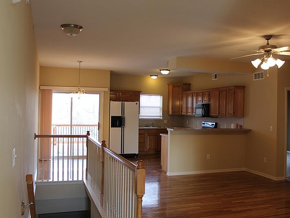 Kitchen with a sliding door to the deck