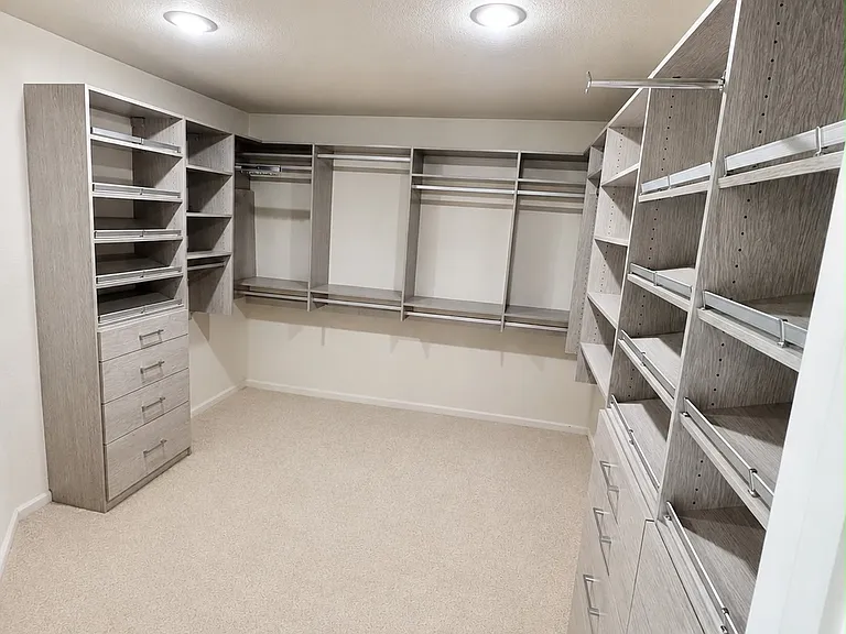 Custom California Closets walk-in, designed for optimal storage and organization