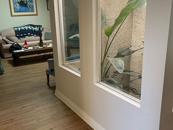 view into living room next to atrium