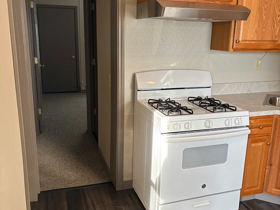 Kitchen to hall, bathroom, bedroom