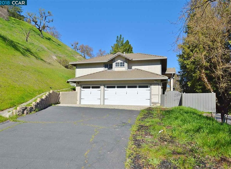 Huge driveway and 3 car oversized garage.