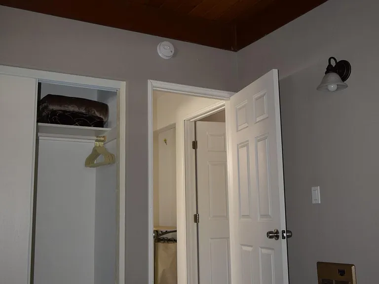 Both bedrooms include electric wall mounted heaters.