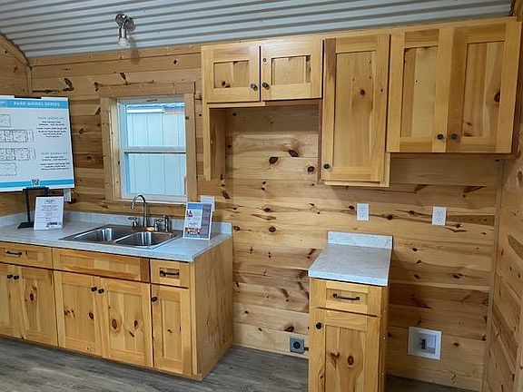 Again, this is just a stock photo. See other pics to see stove, microwave, fridge, and added dishwasher w/ open shelving.