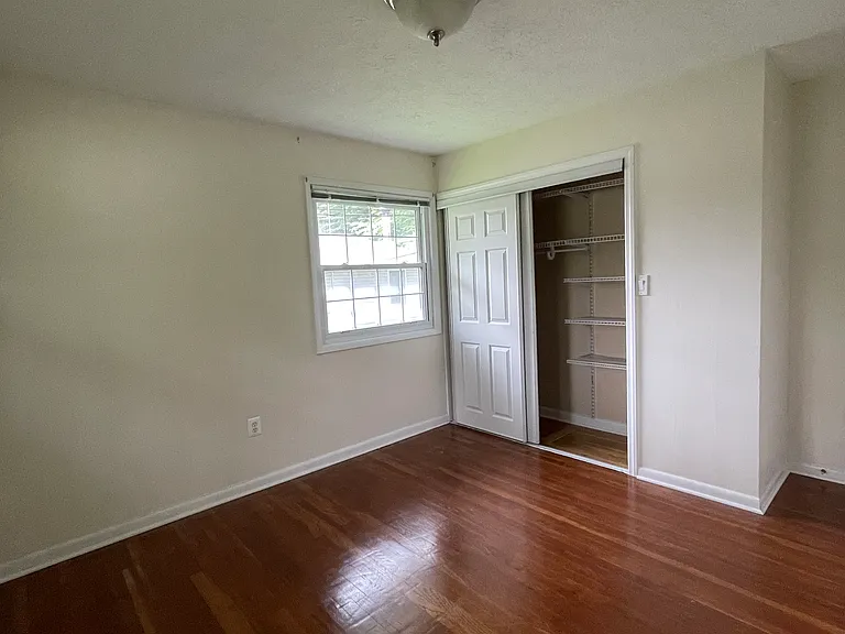 large closet, wooden floors