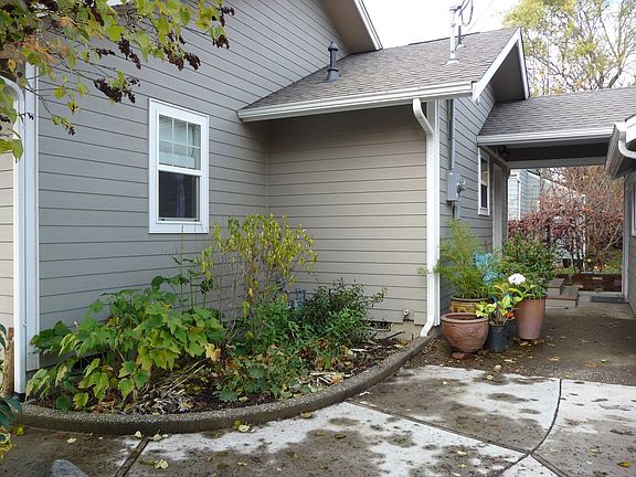 Back of Home-- Breezeway to Garage