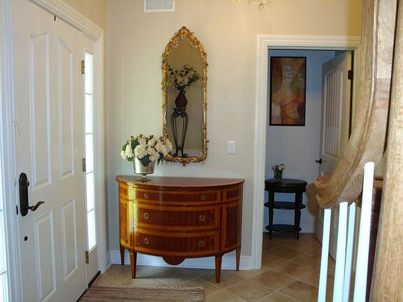 Entry Foyer with Walk-in Closet & Front Staircase