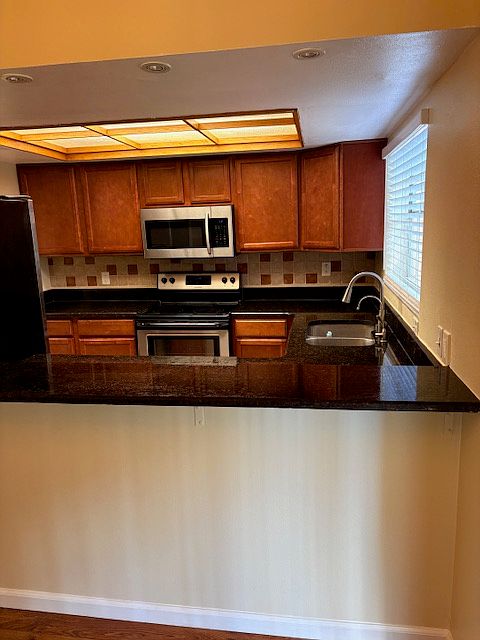 from dining area over the counter to the kitchen