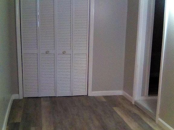 behind doors laundry area