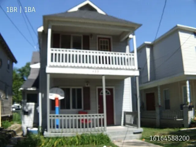 NE one bedroom upper at 435 Carrier NE with extra room for den or study — Photo 1