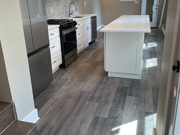 Open concept kitchen/dining. Kitchen is 14'6" X 10'6". Dining area is 11' X 10'6" w access to private courtyard (photos coming soon).