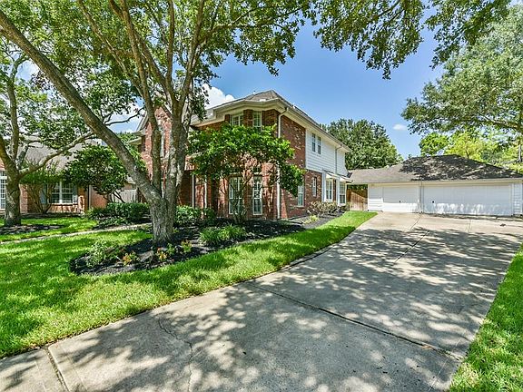 The extensive driveway leads you to the 3 car detached garage, plenty of space for parking here!