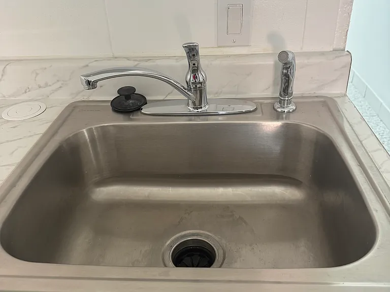 New sink and trash compactor