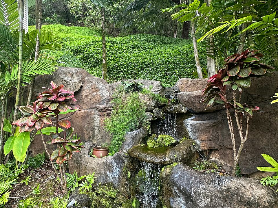 Water feature and beautiful landscaping are part of your lanai!