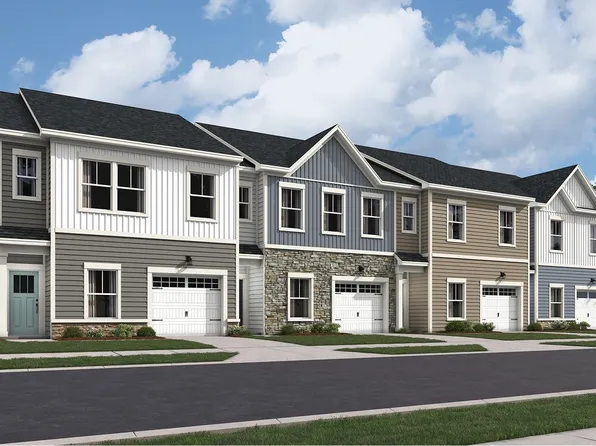 Devon Front Load Garage Plan, Newdale Acres : Townhomes