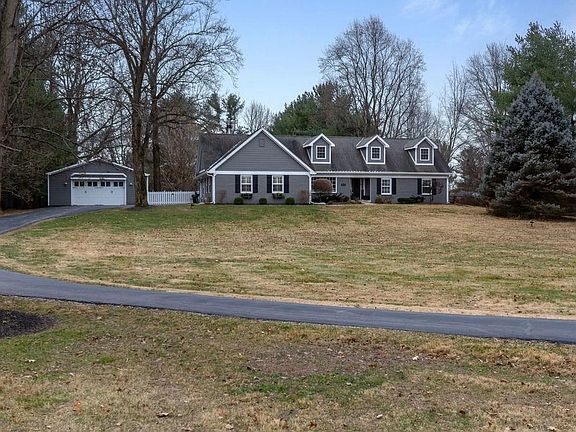 Winding driveway leads you back to your private retreat!