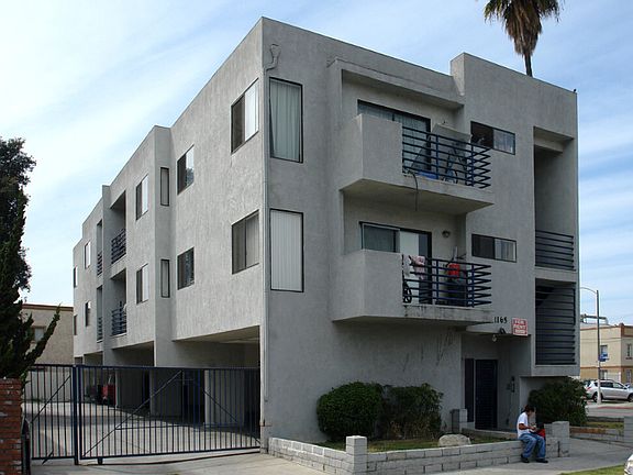 Building with security gate, view facing Locust