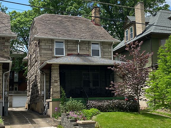 Front with screen closed on porch