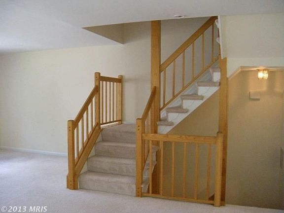 main floor stairway to up and down stairs: note: photo taken