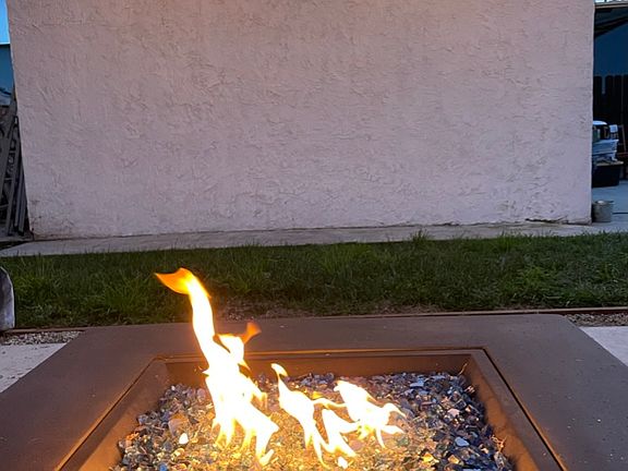 Cozy firepit in the backyard patio.