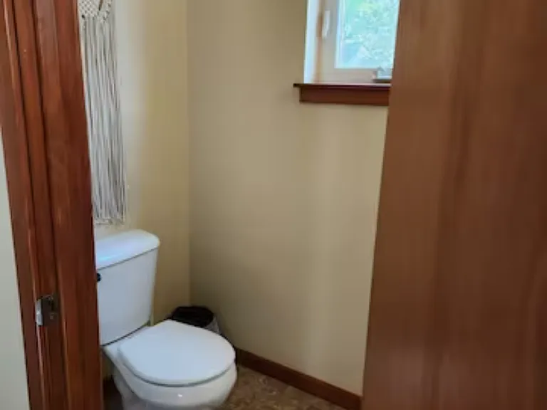 .5 bath attached to downstairs bedroom
