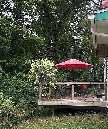 deck located off kitchen
