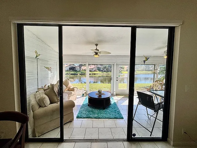 view from the kitchen and indoor dining area - out to the lake