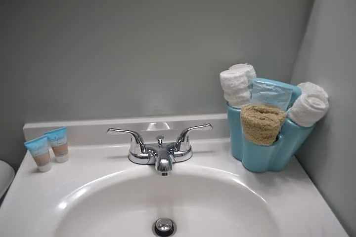 Bathroom sink with built in medicine cabinet for extra storage