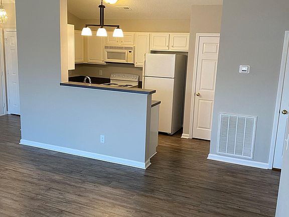 Open floor plan view into the kitchen.