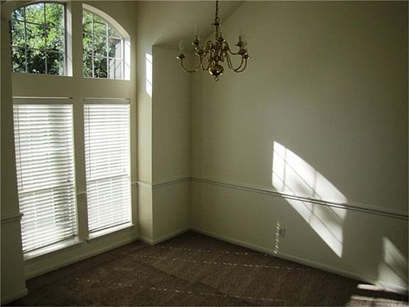 Formal dining is opposite the study.