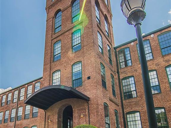 Front entrance with visitor parking