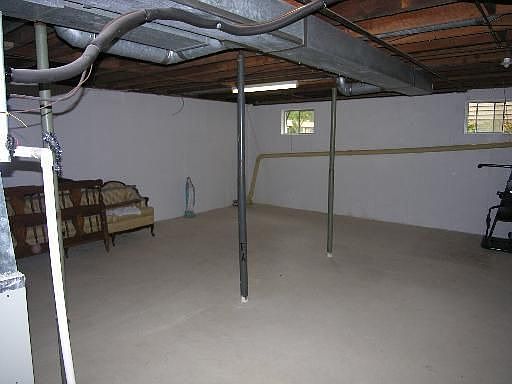Full, partially finished basement offers lots of potential